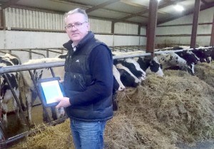 Denis-Burke-using-Herdwatch-on-his-farm-in-Co_-Mayo-1280x895-300x210